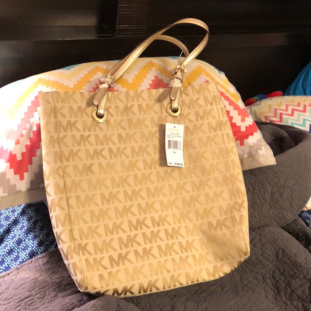 Michael Kors jet set tote gold